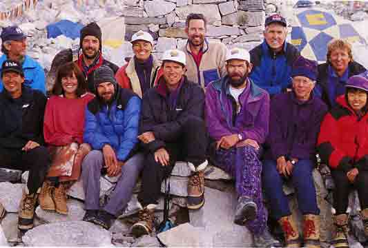 
Adventure Consultants 1996 Everest Expedition: Standing: John Taske, Stuart Hutchison, Helen Wilton, Beck Weathers, Lou Kasischke, Michael Groom. Seated: Doug Hansen, Susan Allen, Jon Krakauer, Andy Harris, Rob Hall, Frank Fischbeck, Yasuko Namba. - Hall and Ball book
